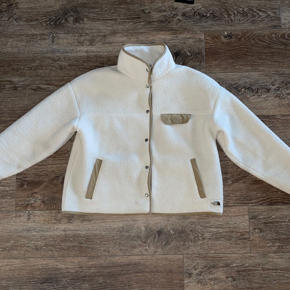Like NEW!  Only worn a few times.  Super warm, fleece button up coat!